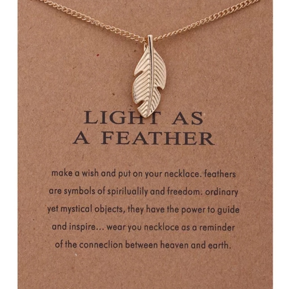 Gold Feather statement charm necklace